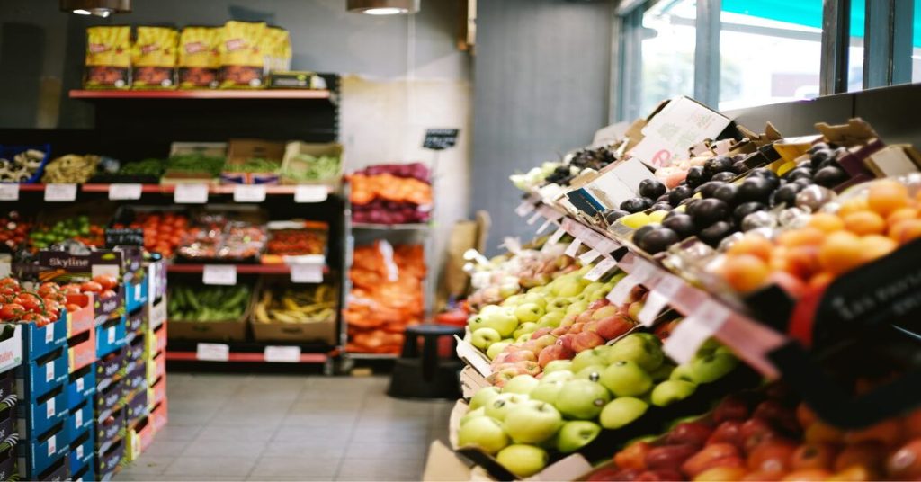 Fresh produce on display in a grocery store, highlighting themes of nutrition, grocery shopping, and daily life necessities